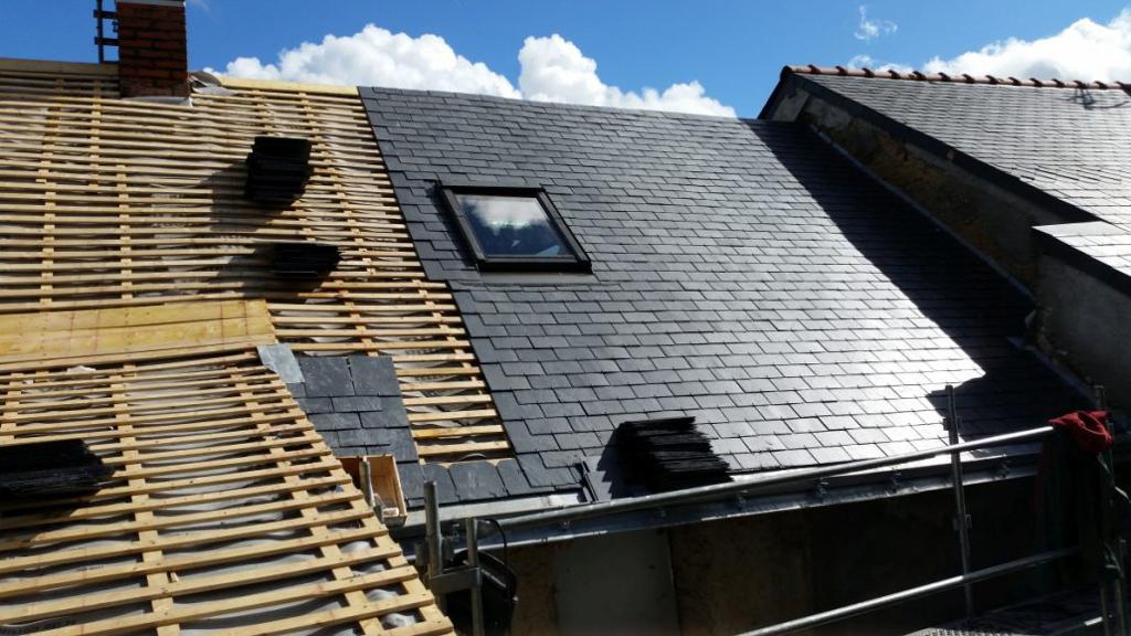 Rénovation partielle d'une toiture en ardoise